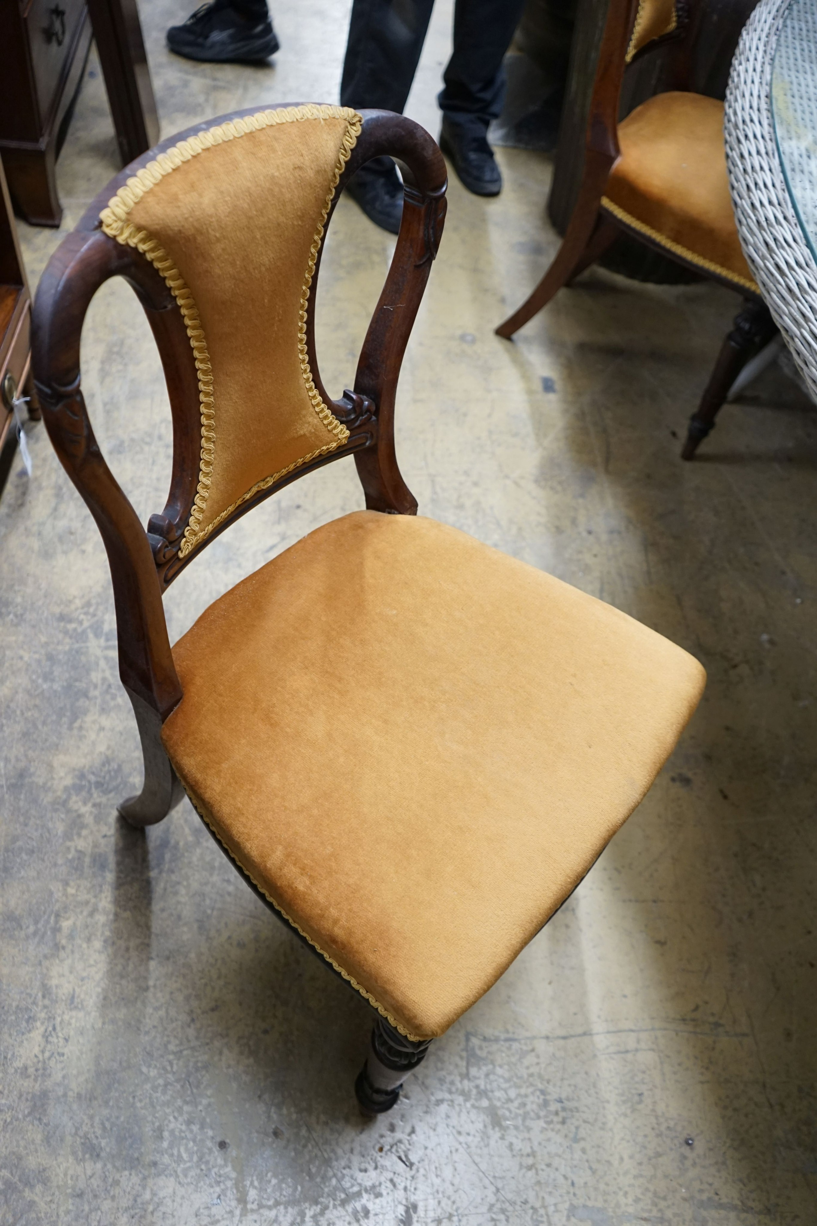 A set of five Victorian rosewood dining chairs
